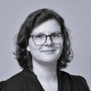 Bllack and white headshot of Anja Klein, smiling slightly